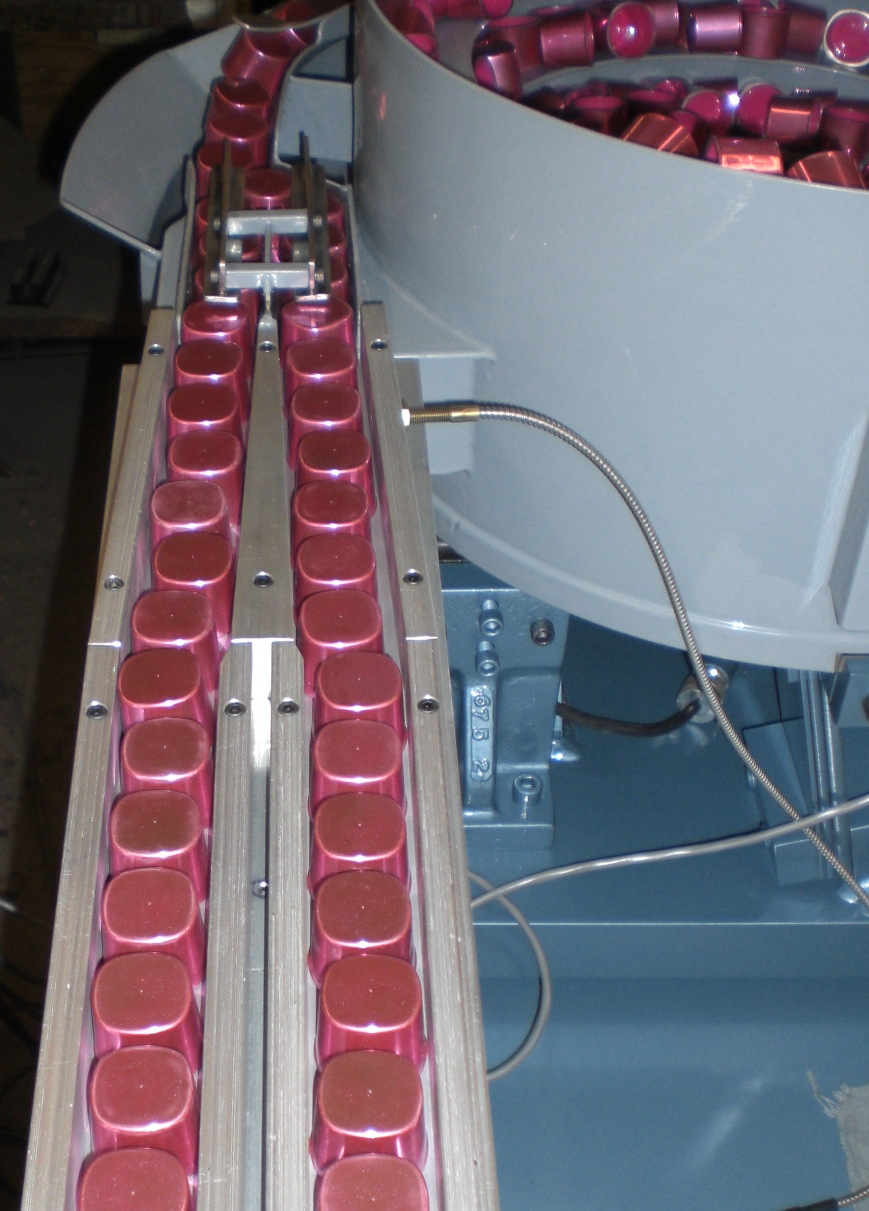 Parts Feeders Inc Cap Feeding